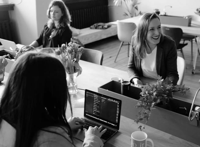 women sitting around a table